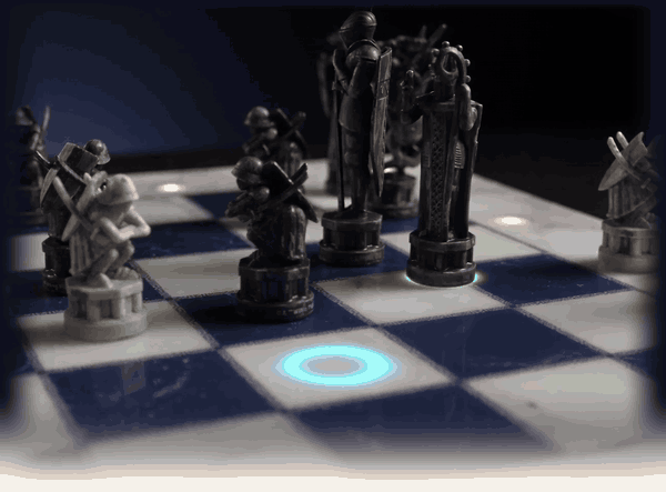 A piece crosses the board on its own and lands on the lit square as the dark gives way to light