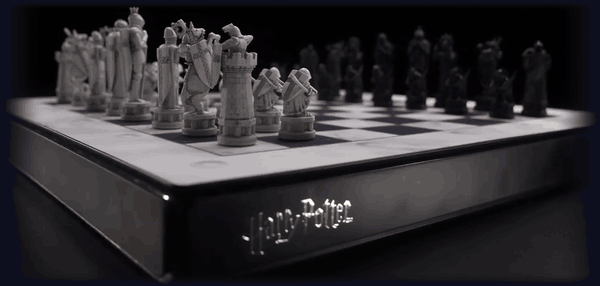The Harry Potter mark lights up along the edge of the board as the camera moves in